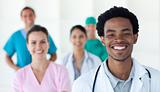 Multi-ethnic medical people smiling at the camera 