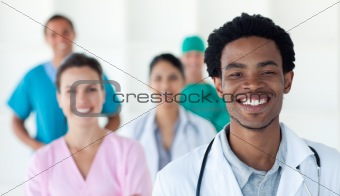 Multi-ethnic medical people smiling at the camera 