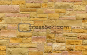 Seamless gold and pink masonry background