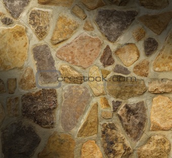 Masonry wall with irregular shaped stones 