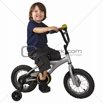Cute boy riding bicycle