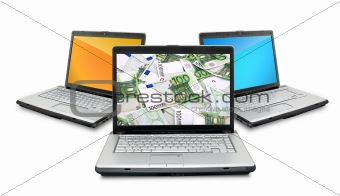 Open laptops with money 