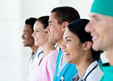Multi-ethnic medical team standing in a line