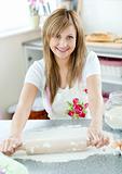 Attractive woman preparing a meal in the kitchen 