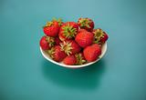 Strawberries on blue background