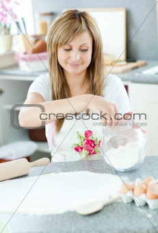 Delighted woman using floor in the kitchen 
