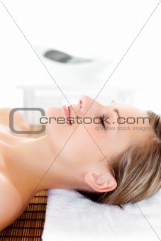 Portrait of a happy woman having a massage 