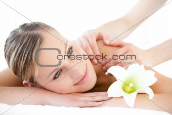 Beautiful woman receiving a back massage 