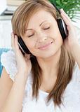 Attractive woman listening music with headphones