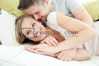 Adorable lovers having fun together in the living-room