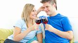 Charming couple drinking wine together 