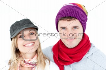 Charming couple looking at the camera together 