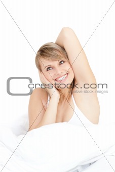 Beautiful woman stretching while getting up
