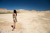 sensual woman walking at the desert