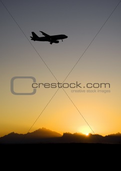 Silhouette of an aircraft landing