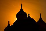 Silhouetted minarets in the sunset