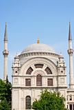 Ornate mosque with blue sky