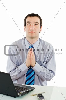 Praying businessman