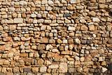 Old stone wall in Faro, Portugal