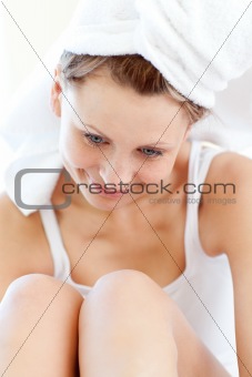 Smiling woman wearing a towel  