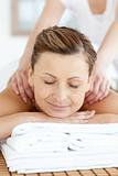 Radiant woman enjoying a back massage