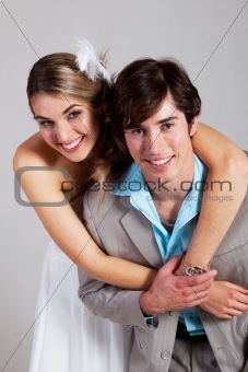 Smiling Young Couple Embracing