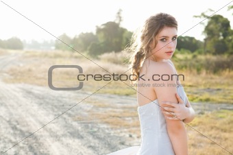 Attractive Young Woman in a Rural Landscape