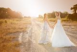 Bride and Bridesmaid on a Country Road