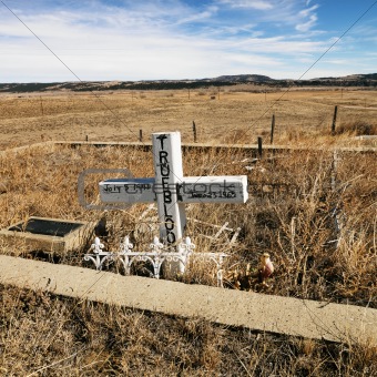 A cross tombstone.