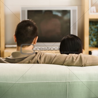 Couple watching TV.