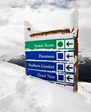 Snow covered sign.