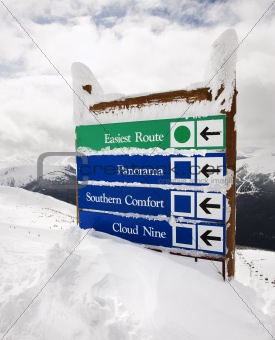 Snow covered sign.