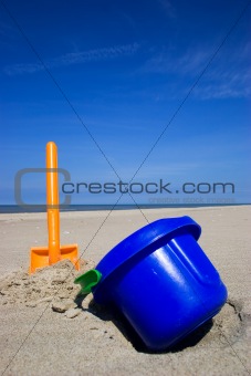 Beach spade and bucket