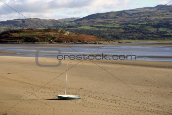 Boat stranded on sand