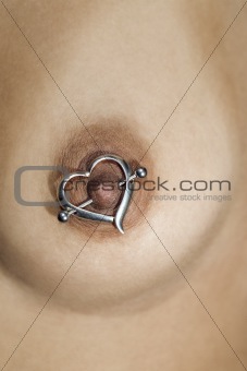 Heart nipple ring.