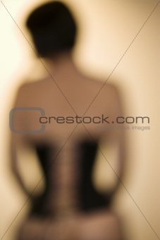 Woman wearing corset.
