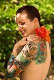 Tattoed woman with flowers.