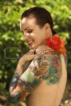 Tattoed woman with flowers.