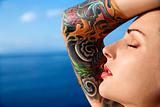 Attractive tattooed woman.