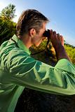 man using binocular