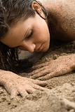 Woman in sand.