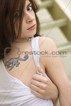 Young woman with tattoo.