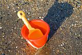 Bucket and spade on tropical beach