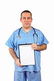 Male doctor showing a blank clipboard