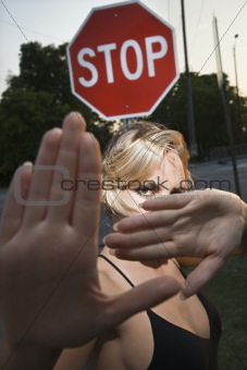 Woman making hand gestures.