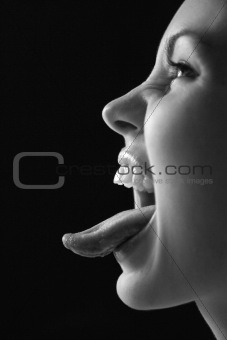 Woman sticking out tongue.