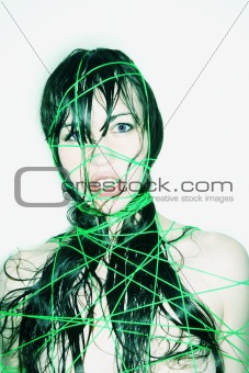 Nude woman bound with string.
