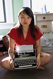 Woman with typewriter.