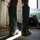 Green rubber boots.