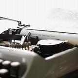 Typewriter with paper.